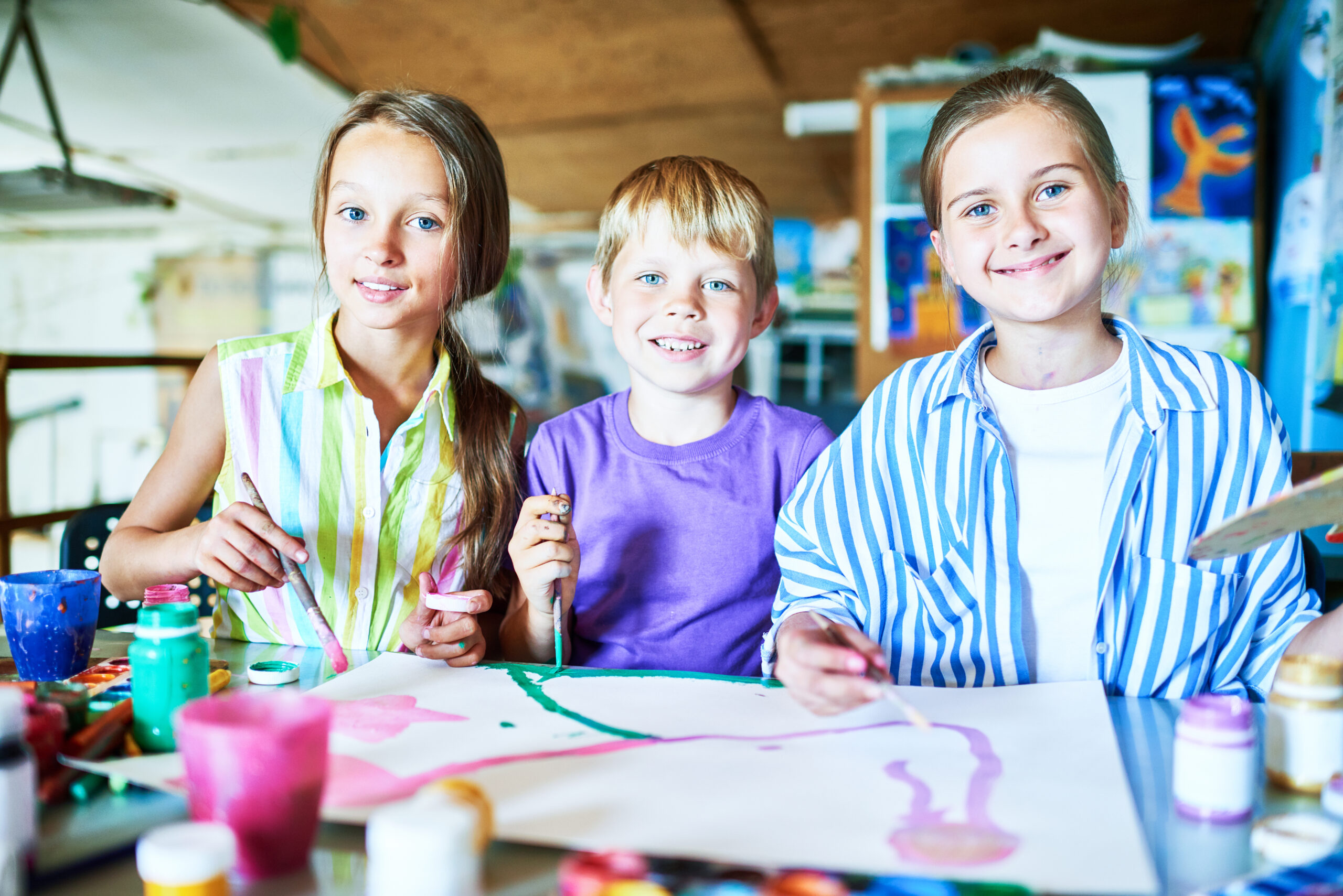 Happy Children Posing in Art Class